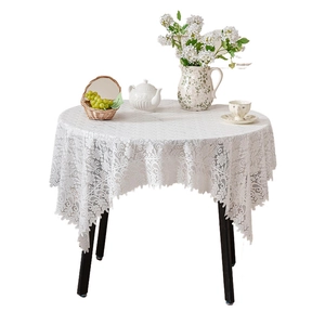 White vintage floral lace tablecloth with scalloped edges for round dining tables