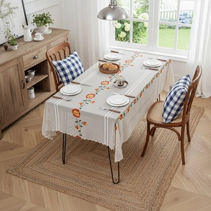Rectangle cream tablecloth with orange floral patterns and elegant lace trim edges