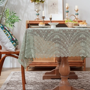 Light green floral lace tablecloth with scalloped edges for elegant home table decoration