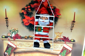 Detailed view of 60cm climbing Santa Claus plush doll on white rope ladder ornament