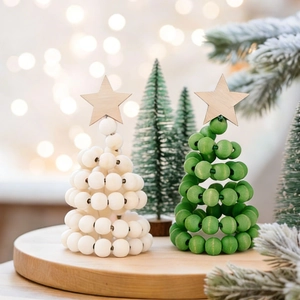 Minimalist wood bead Christmas tree set with stars on a warm festive background