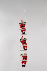 Detail of three Santa figures climbing a white rope ladder for Christmas decoration