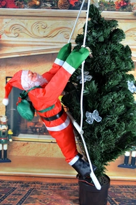 Dettaglio di Babbo Natale da 40cm su scala di corda con sacco per decoro albero di Natale