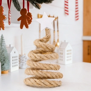 Detail of Nordic minimalist woven hemp rope Christmas tree desk decor with white star top