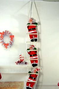 Three Santa dolls climbing a white rope ladder for indoor Christmas festive wall decoration