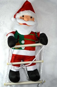 Detail of plush Santa Claus figure climbing a three-step white rope ladder decoration