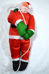Détail du Père Noël de 50 cm avec costume rouge et gants verts pour décoration