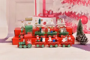 Detailed view of miniature 4-section wooden Christmas train with snowman and santa deco