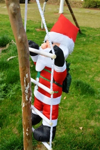 Outdoor 60cm climbing Santa Claus figurine hanging on a white rope ladder