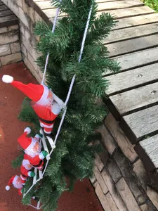 Detailed view of three Santa Claus figures climbing a white rope on a pine tree branch