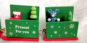 Detailed close-up of 4-section wooden Christmas train decor with gift boxes and tree