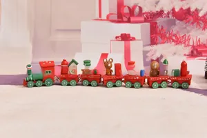 Detailed macro view of 7-section wooden Christmas train with hand-painted holiday figurines
