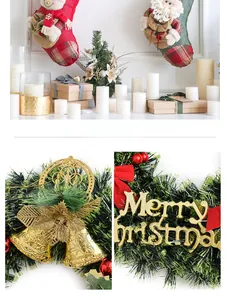 Detail of 40cm Christmas wreath with Merry Christmas sign, bells and plush socks decoration