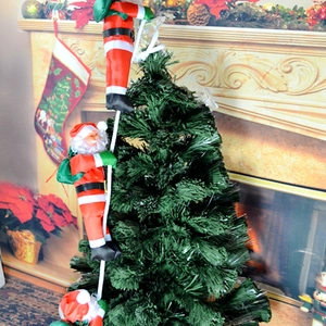 Three climbing Santa Claus hanging ornaments on rope with green fiber Christmas tree