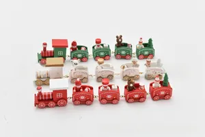 Close-up of a 5-section wooden Christmas train with snowman and tree decorations