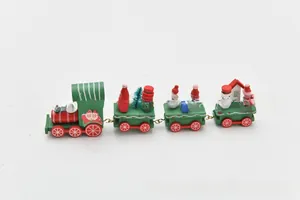 Detail of wooden 4-section Christmas train featuring Santa, snowman and trees on white background