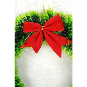 30cm Christmas tinsel wreath with lush green foliage and a large red decorative bow