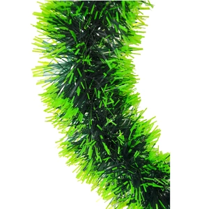 Lush 30cm green Christmas tinsel wreath with white ribbon bow and dense festive foliage