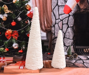 Close-up of white plush fabric texture and pleats on a cone-shaped Christmas tree