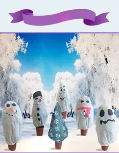Garden plant freeze protection covers with festive snowman and snowflake patterns