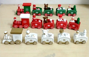 Detail of wooden 7-section Christmas train set featuring Santa, snowman and bear figurines