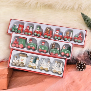 Wooden Christmas train set ornaments with Santa and snowman figures in gift packaging
