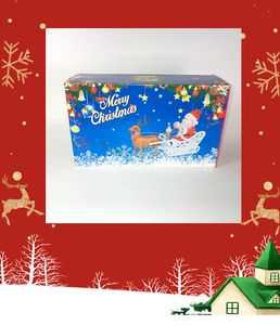 Vue détaillée du coffret cadeau Merry Christmas avec décor Père Noël et rennes