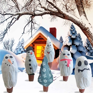 Christmas non-woven plant covers with festive snowman and snowflake patterns for winter protection