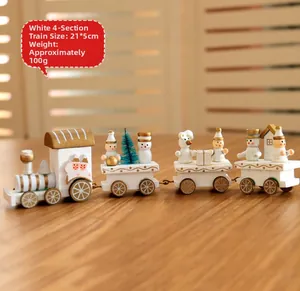 Detailed view of a white 4-section wooden Christmas train with snowman and bear figurines