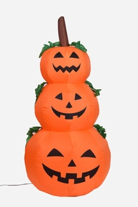 Three-tier inflatable orange pumpkins with spooky faces and green leaves for Halloween decor