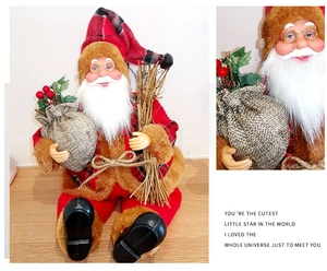 Detailed view of sitting Santa Claus figure with plaid hat, gold glasses and burlap sack