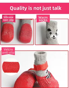 Detail of non-slip silicone sole and adjustable velcro strap on red pet socks