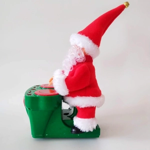 Père Noël animé jouant du tambour avec musique, décor et cadeau de Noël festif