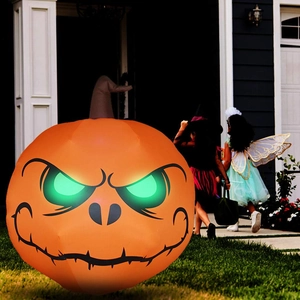 Detail of 1.2m inflatable Halloween pumpkin with glowing green eyes and a wizard hat