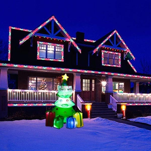 Detailed view of an inflatable Christmas tree featuring colorful glowing gift boxes and LED lights