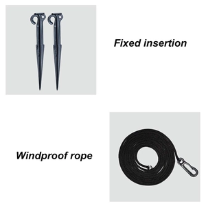 Detail of high-strength black ground stakes and windproof ropes with carabiners