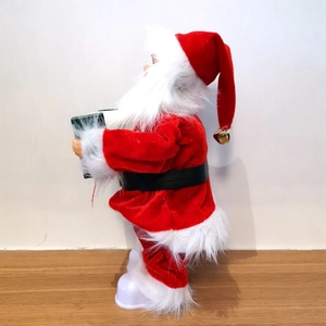 Electric 30cm musical Santa Claus figurine with red velvet suit and bell on a white base