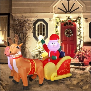 Inflatable Santa Claus with red sleigh and two reindeer with built-in LED lights