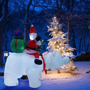 Close-up of 2.1m inflatable Santa riding a polar bear with built-in LED glowing lights