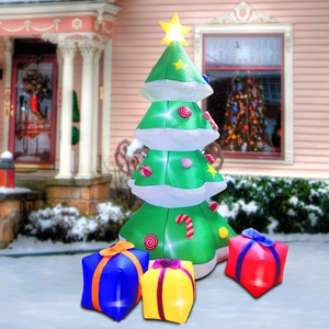 Macro detail of a 2.1m inflatable Christmas tree with glowing star and gift boxes