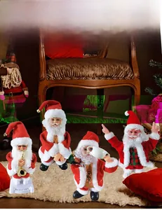 Collection of electric musical dancing Santa Claus dolls with instruments and accessories