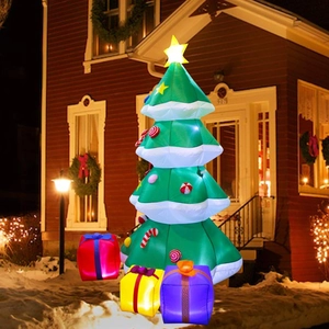Detail of 2.1M inflatable Christmas tree with glowing gift boxes in outdoor snowy night scene