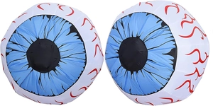 Close-up of two inflatable Halloween eyeballs with detailed red veins and blue iris texture