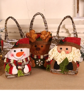 Three-piece set of Christmas felt gift bags featuring Santa, snowman, and reindeer motifs