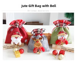 Three Christmas burlap gift bags with 3D plush Santa, reindeer, and snowman dolls