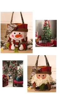 Detail of 3D Santa and Snowman felt gift bags with sequins and bells in a festive setting
