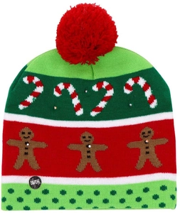 Detail of knitted Christmas hat with candy cane patterns and LED ON/OFF power switch