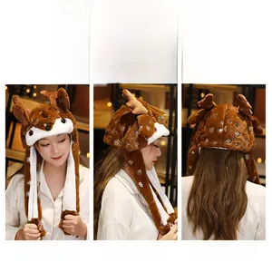Front, side, and back views of a plush brown reindeer hat with white snowflake patterns
