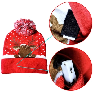 Colorful LED Christmas knit hat with reindeer and snowflake patterns and switch detail