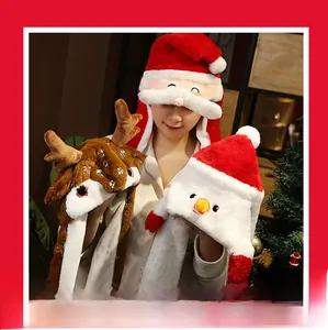 Detailed view of plush Santa and reindeer ear hats with moving ears for Christmas